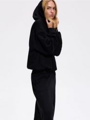 Bluza z kapturem - czarny. Czarne bluzy damskie Reserved, l, bez wzorów, z bawełny, z kapturem. Za 129.99 zł.