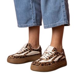 Panterkowe sneakersy trampki na grubej podeszwie brązowe. Brązowe trampki damskie bez wzorów, z gumy, bez zapięcia. Za 135.07 zł.