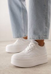 Białe Sneakersy VICES na Grubej Podeszwie z Tłoczonym Napisem i Perforacją Cezite. Białe obuwie sportowe damskie Born2be, z jeansu, bez zapięcia. Za 129.99 zł.