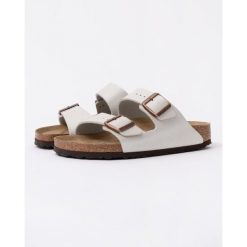 Klapki Birkenstock Arizona Birko Flor Damskie. Szare klapki damskie Birkenstock, bez wzorów, z materiału, bez obcasa, bez zapięcia. Za 504.40 zł.