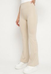 Jasnobeżowe Legginsy Typu Dzwony z Wysokim Stanem Orralise. Brązowe legginsy damskie Born2be, m, bez wzorów, z jeansu. Za 44.99 zł.