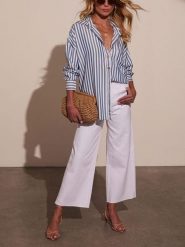 Milan Kiss Bluzka w kolorze niebiesko-białym rozmiar: L. Białe bluzki damskie Milan Kiss, l, bez wzorów, bez kołnierzyka, bez ramiączek. Za 152.99 zł.