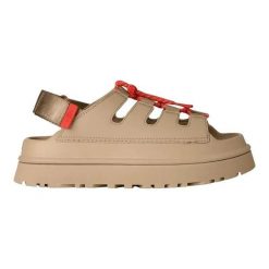 Sandały Ugg Australian W Goldenglow Toggle Damskie. Brązowe sandały damskie Ugg, bez wzorów, z materiału, bez obcasa, bez zapięcia. Za 571.99 zł.