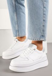 Biało-Srebrne Sneakersy na Grubej Podeszwie z Napisem i Brokatem Odivena. Białe obuwie sportowe damskie Born2be, z jeansu, bez zapięcia. Za 89.99 zł.