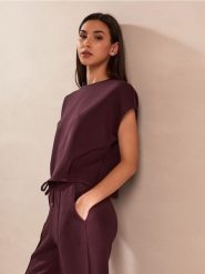 Bluza bez rękawów soft touch z dodatkiem wiskozy - czerwony. Czerwone bluzy damskie Sinsay, l, bez wzorów, z dzianiny, bez kaptura. Za 39.99 zł.