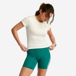 Koszulka fitness damska Domyos prążkowana. Białe bluzki damskie DOMYOS, s, bez wzorów, z elastanu, sportowe, bez kołnierzyka, bez ramiączek. Za 69.99 zł.