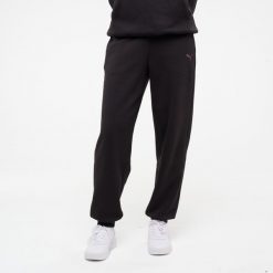 Spodnie fitness damskie Puma. Czarne spodnie materiałowe damskie Puma, bez wzorów, z bawełny. Za 129.99 zł.