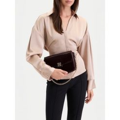 Torebka Nine West. Czerwone torebki wieczorowe damskie Nine West, bez wzorów, bez dodatków. Za 179.99 zł.