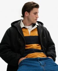 Superdry Kurtka z kapturem Canvas Surplus z bawełny z pikowaną podszewką. Czarne kurtki damskie Superdry, m, z aplikacjami, z bawełny, z kapturem. Za 391.00 zł.