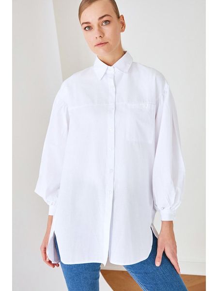 Trendyol Bluzka w kolorze białym rozmiar: 42. Białe bluzki damskie Trendyol, bez wzorów, bez kołnierzyka, bez ramiączek. Za 66.00 zł.