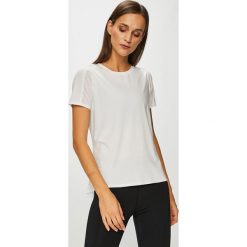 Calvin Klein Performance - Top. Szare koszulki sportowe damskie Calvin Klein Performance, z dzianiny, z krótkim rękawem. Za 159.90 zł.