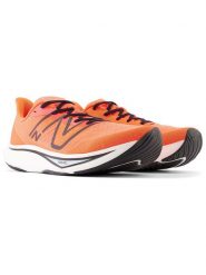 New Balance Buty "FuelCell Rebel v4" w kolorze pomarańczowym do biegania rozmiar: 41,5. Pomarańczowe obuwie sportowe damskie New Balance, z materiału, do biegania. Za 476.95 zł.