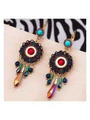 LA CHIQUITA Pozłacane kolczyki z kryształami rozmiar: onesize. Żółte kolczyki damskie LA CHIQUITA, z kryształem, pozłacane. Za 139.54 zł.