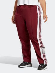 Adidas Spodnie sportowe w kolorze bordowym rozmiar: 4X. Czerwone spodnie dresowe damskie Adidas, s, bez wzorów, z materiału, outdoorowe. Za 153.71 zł.