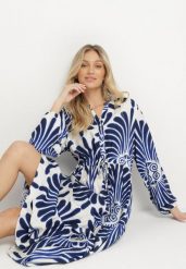Niebieska Sukienka z Wiskozą o Rozkloszowanym Kroju z Motywem Roślinnym Korisaria. Niebieskie sukienki damskie Born2be, bez wzorów, z wiskozy, eleganckie, bez ramiączek. W wyprzedaży za 101.99 zł.