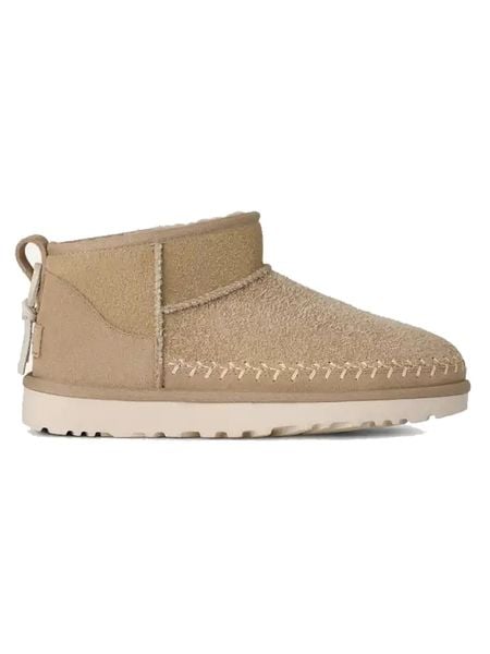 UGG Skórzane botki "Classic Ultra Mini Biarritz" w kolorze beżowym rozmiar: 36. Brązowe botki damskie Ugg, ze skóry, bez obcasa, bez zapięcia. Za 699.95 zł.