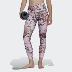 Damskie legginsy z nadrukiem do jogi adidas Essentials. Białe legginsy sportowe damskie Adidas, m, bez wzorów, na jogę i pilates. W wyprzedaży za 181.85 zł.