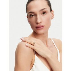 Pierścionek Guess. Żółte pierścionki damskie Guess, złote. Za 119.99 zł.