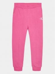 Calvin Klein Jeans Spodnie dresowe Logo IG0IG02285 Różowy Regular Fit. Czerwone jeansy dziewczęce Calvin Klein Jeans, bez wzorów, z bawełny. Za 299.99 zł.