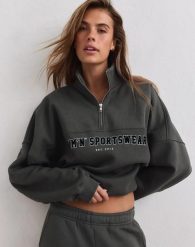 Damska bluza dresowa z półzamkiem, drapana, luźna Varsity ciemna zieleń. Zielone bluzy damskie Aim'n, xl, bez wzorów, z bawełny, bez kaptura. Za 350.00 zł.