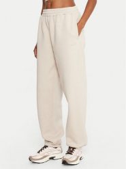 Reebok Spodnie dresowe Reebok X Ewa Chodakowska RK25304CCW Beżowy Regular Fit. Brązowe spodnie dresowe damskie Reebok, l, bez wzorów, z dresówki. Za 179.99 zł.
