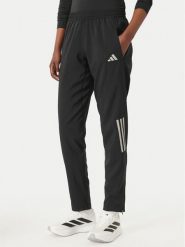 Adidas Spodnie dresowe Astro KC4947 Czarny Regular Fit. Czarne spodnie dresowe damskie Adidas, xs, bez wzorów, z dresówki. Za 299.99 zł.