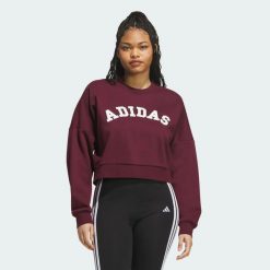 BLUZA Z TKANINY SZENILOWEJ Z LOGO I GRAFIKĄ. Czerwone bluzy damskie Adidas, na zimę, xs, z aplikacjami, z bawełny, bez kaptura. Za 259.00 zł.