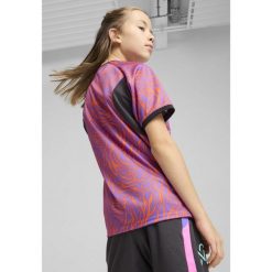 Młodzieżowa koszulka piłkarska Neymar Jr Creativity PUMA. Fioletowa bluzki damskie Puma, m, bez wzorów, bez kołnierzyka, bez ramiączek. W wyprzedaży za 94.00 zł.