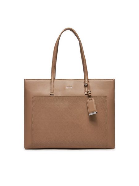 Calvin Klein Torebka Ck Must Medium Shopper_Mono K60K612774 Beżowy. Brązowe shopper bag Calvin Klein, bez wzorów, ze skóry, bez dodatków. Za 379.99 zł.