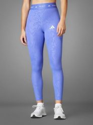 Adidas Legginsy sportowe w kolorze fioletowym rozmiar: XS. Różowe legginsy damskie Adidas, xs, bez wzorów, z materiału. Za 96.37 zł.