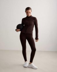 Damskie legginsy z wysokim stanem, squat proof, dla niskich Sense czekoladowe. Brązowe legginsy damskie Aim'n, xs, bez wzorów, z elastanu. Za 296.00 zł.