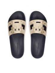 Tommy Hilfiger Klapki Th Pool Slide FW0FW09613 Złoty. Żółte klapki damskie Tommy Hilfiger, bez wzorów, ze skóry, bez obcasa, bez zapięcia. Za 189.99 zł.