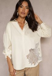 Ciemnobeżowa Koszula z Bawełny Ozdobiona Ażurową Wstawką Donivessa. Brązowe koszule damskie Renee, l, w ażurowe wzory, z bawełny, eleganckie, bez kołnierzyka, bez ramiączek. Za 54.99 zł.