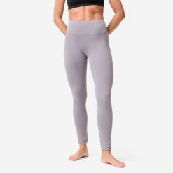 Legginsy do jogi i pilatesu Domyos. Fioletowe legginsy damskie DOMYOS, l, bez wzorów, z elastanu, na jogę i pilates. Za 119.99 zł.