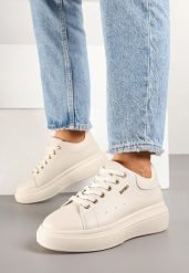 Beżowe Sneakersy na Grubej Podeszwie z Metalicznymi Zdobieniami Zarilna. Brązowe obuwie sportowe damskie Born2be, z jeansu, bez zapięcia. Za 84.99 zł.