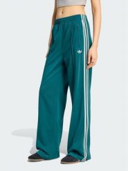 Adidas Spodnie dresowe FIREBIRD Zielony Loose Fit. Zielone spodnie dresowe damskie Adidas, xl, bez wzorów, z dresówki. Za 298.99 zł.