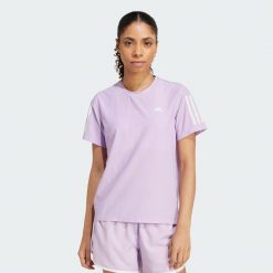 Koszulka Own The Run. Czerwone koszulki damskie Adidas, s, bez wzorów, z materiału, bez kołnierzyka, bez ramiączek. Za 149.00 zł.