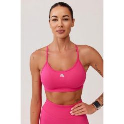 Stanik sportowy bezszwowy Rough Radical Seamless Glow Bra. Czerwone biustonosze sportowe damskie ROUGH RADICAL, bez wzorów. W wyprzedaży za 103.92 zł.