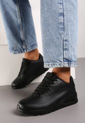 Czarne Klasyczne Płaskie Sneakersy z Ozdobną Podeszwą i Perforacją Dinelia. Czarne obuwie sportowe damskie Born2be, z materiału, bez zapięcia. Za 99.99 zł.