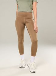 Legginsy sportowe z wysokim stanem - brązowy. Brązowe legginsy damskie Sinsay, l, bez wzorów. W wyprzedaży za 17.99 zł.