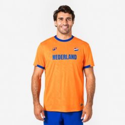 Koszulka piłkarska Holandia dla kibiców. Brązowe bluzki damskie KIPSTA, s, bez wzorów, z materiału, sportowe, bez kołnierzyka, bez ramiączek. Za 44.99 zł.