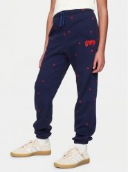 Gap Spodnie dresowe 645537-00 Granatowy Regular Fit. Niebieskie spodnie dresowe dziewczęce GAP, bez wzorów, z bawełny. Za 99.99 zł.
