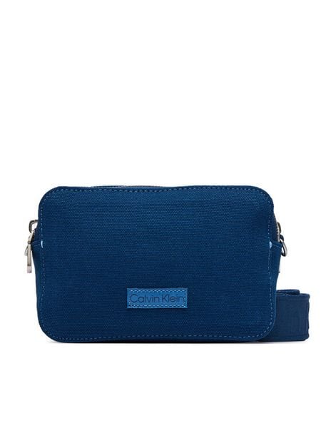 Calvin Klein Torebka Webbing Strap Canvas Camera Bag LV04F3385G Niebieski. Niebieskie listonoszki damskie Calvin Klein, bez wzorów, z materiału, bez dodatków. Za 232.99 zł.