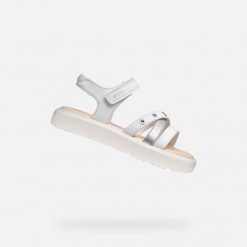 Sandały GEOX J SANDAL KODETTE GIR Biały. Białe sandały damskie Geox, bez wzorów, z syntetyku, bez obcasa, bez zapięcia. Za 225.99 zł.
