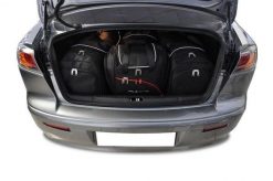 Torby Do Bagażnika Mitsubishi Lancer Limousine 2007-2016 4Szt Kjust. Czarne torby podróżne KJUST, bez wzorów, z kauczuku. Za 1,220.00 zł.