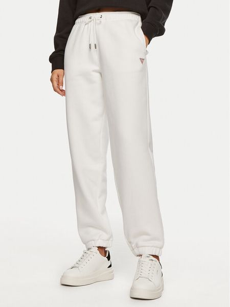 Guess Jeans Spodnie dresowe W4YB33 KC811 Biały Regular Fit. Białe spodnie dresowe damskie Guess Jeans, xs, z aplikacjami, z bawełny. Za 169.99 zł.