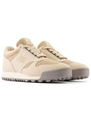 New Balance Skórzane sneakersy "Rainer" w kolorze beżowym rozmiar: 44,5. Brązowe obuwie sportowe damskie New Balance, z materiału, bez zapięcia. Za 276.71 zł.