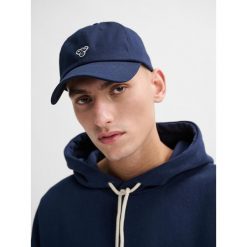 Czapka baseballowa Hummel. Niebieskie czapki damskie Hummel, na lato, bez wzorów, z bawełny. Za 157.00 zł.