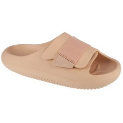 Klapki Crocs Mellow Luxe Recovery Slide 209413-2DS beżowy. Brązowe klapki damskie bez wzorów, bez obcasa, bez zapięcia. Za 357.75 zł.