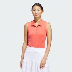Koszulka Women's Ultimate365 Solid Sleeveless Polo. Czerwone bluzki damskie Adidas, s, bez wzorów, z materiału, sportowe, bez kołnierzyka, bez ramiączek. W wyprzedaży za 133.50 zł.